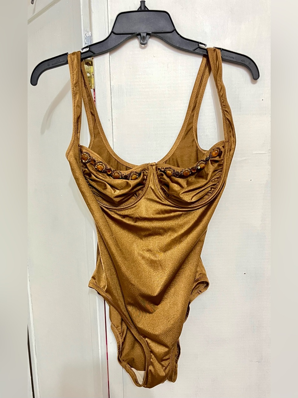 NWOT! DKNY Copper colored 1 piece swimsuit w/ rhinestone bust, and underwire